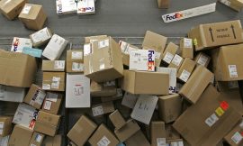 FedEx shares slide amid lower forecasts