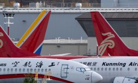 Boeing Reports Smaller Loss but Trade War Threats Loom