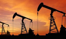 Oil up but set for weekly fall under supply pressure