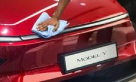 Tesla pledges to make cheaper cars as problems mount
