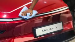 tesla-pledges-to-make-cheaper-cars-as-problems-mount