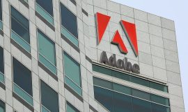 Adobe raises annual revenue and profit forecasts