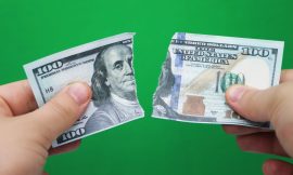 Dollar Drops on Dovish Fed Comments and Heightened China Trade Tensions