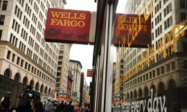 Wells Fargo tops profit estimates, raises return target