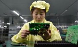 China’s economic growth slows as trade tensions with US flare up