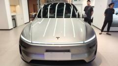 tesla-earnings-slide-despite-record-revenue