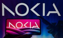 Nokia shares hit near 10-year high