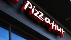 pizza-hut’s-parent-explores-sale-of-struggling-chain