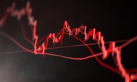 Stocks Slide on Bleak US Job News and Weakness in Chipmakers