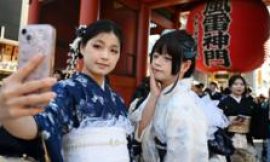 Japan tourism and retail stocks slide after China row