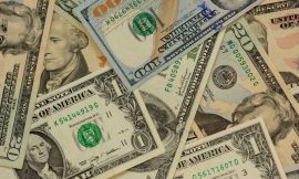 Dollar Tumbles as Fed Boosts Liquidity