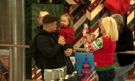 Deck the arrivals halls: Family members welcomed home