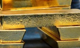 Gold slips on easing geopolitical strains