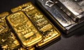 Gold and silver prices fall but FTSE 100 hits record high