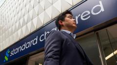 standard-chartered-to-cut-thousands-of-roles-as-ai-use-increases