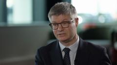 Read more about the article Next boss warns of ‘dramatic’ fall in entry-level jobs