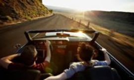 Is the convertible car heading into the sunset?