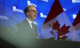 Bank of Canada holds rates, sees economic growth in H2