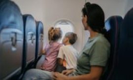 Move to stop charges for parents to sit by children on flights